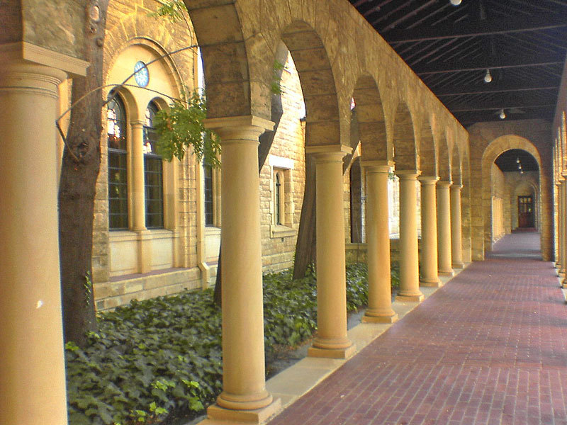 Limestone arches are a prominent feature along the older undercover walkways