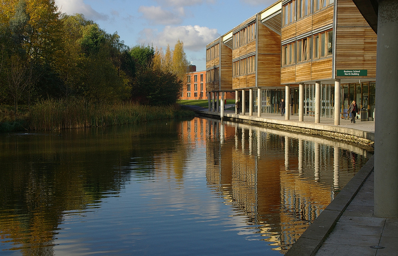 Reflections in the lake on Nottingham University's Jubilee Campus at Business School North Building